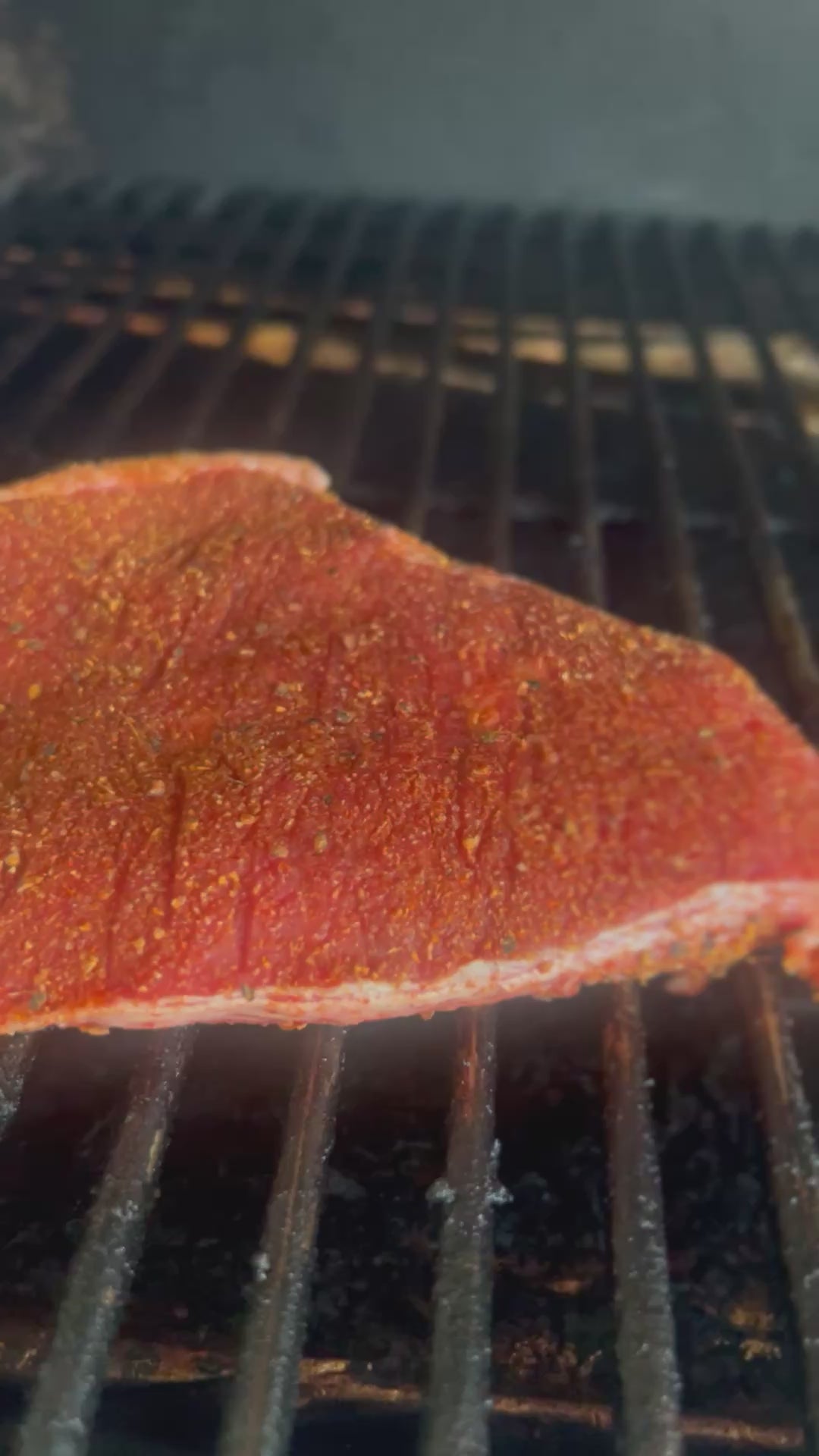 Mad cow Ranch Steak beef on grill smoker sizzling